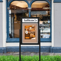 Freestanding EXTREME WeatherPLUS™ Radius Edge Outdoor Enclosed Bulletin Boards with Personalized Message Header + LED Lights | Shown in Black Finish in Portrait Orientation