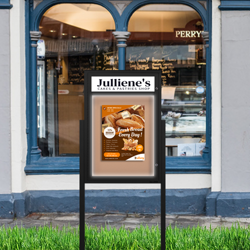 Freestanding EXTREME WeatherPLUS™ Radius Edge Outdoor Enclosed Bulletin Boards with Personalized Message Header + LED Lights | Shown in Black Finish in Portrait Orientation