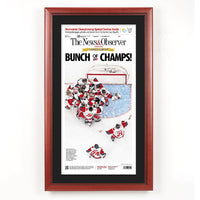 Carolina Hurricanes 2026 Stanley Cup Champions Newspaper Wood Display Frame | Shown with Cherry frame finish and Black Belt matboard